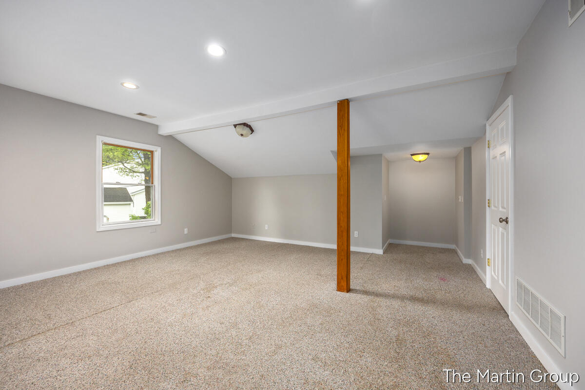 6610 Riga Avenue Northeast Rockford, MI 49341 - Photo 21 of 50 Upper Level Family Room
