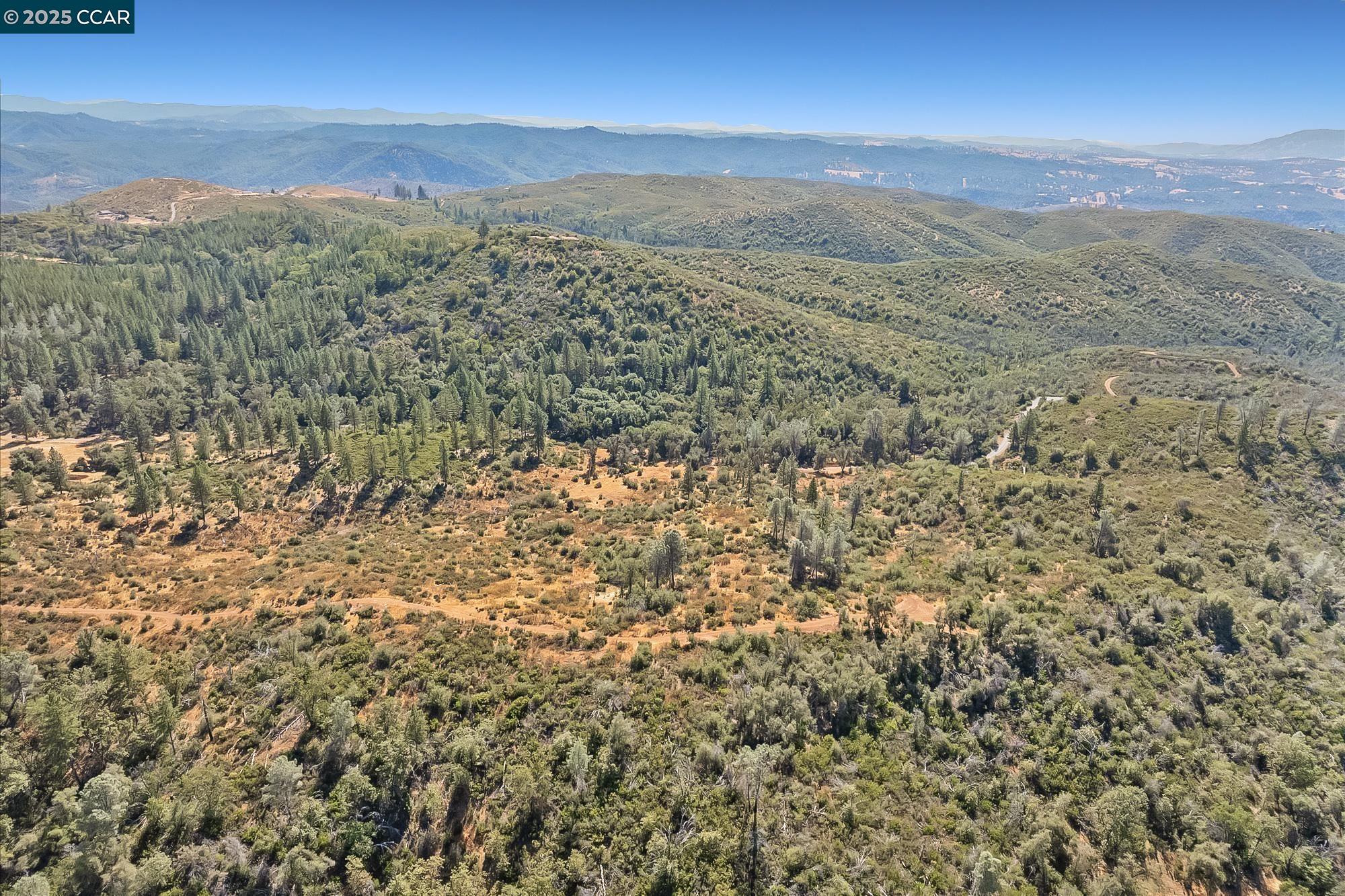 7559 Alamo Rd Mountain Ranch Mountain Ranch, CA 95246 - Photo 12 of 22 a view of a city with mountains in the background