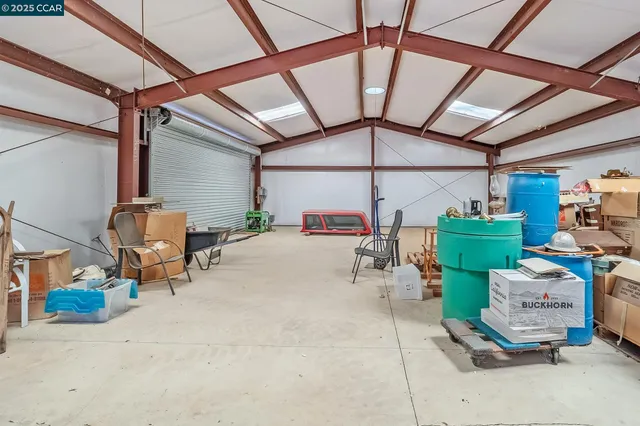 a room with lots of furniture and air hockey table