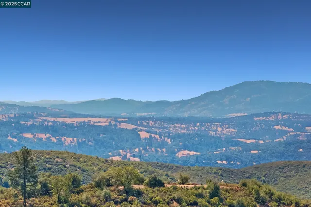 a view of city and mountain