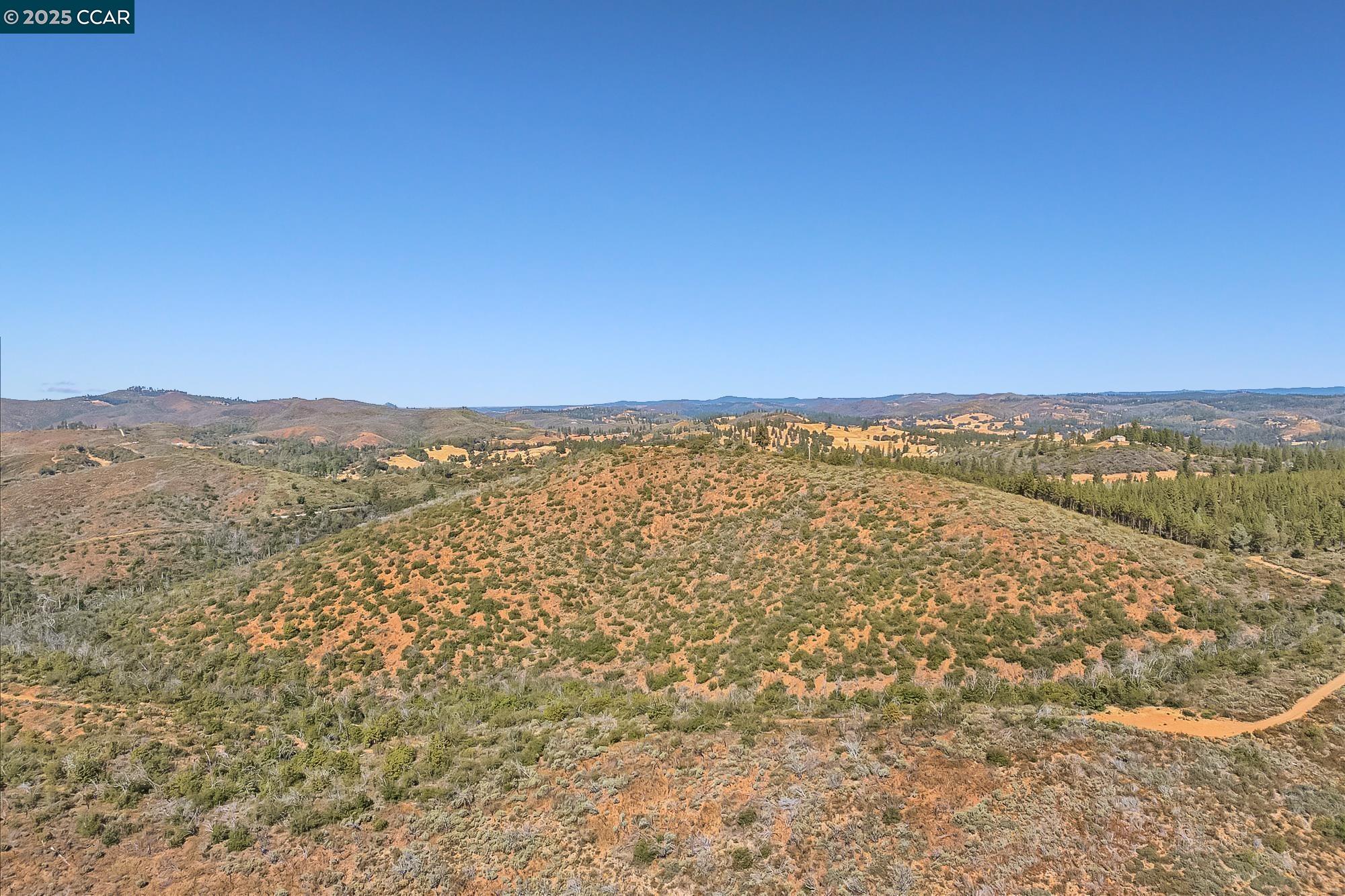 7559 Alamo Rd Mountain Ranch Mountain Ranch, CA 95246 - Photo 5 of 22 a view of an outdoor space with a lake view