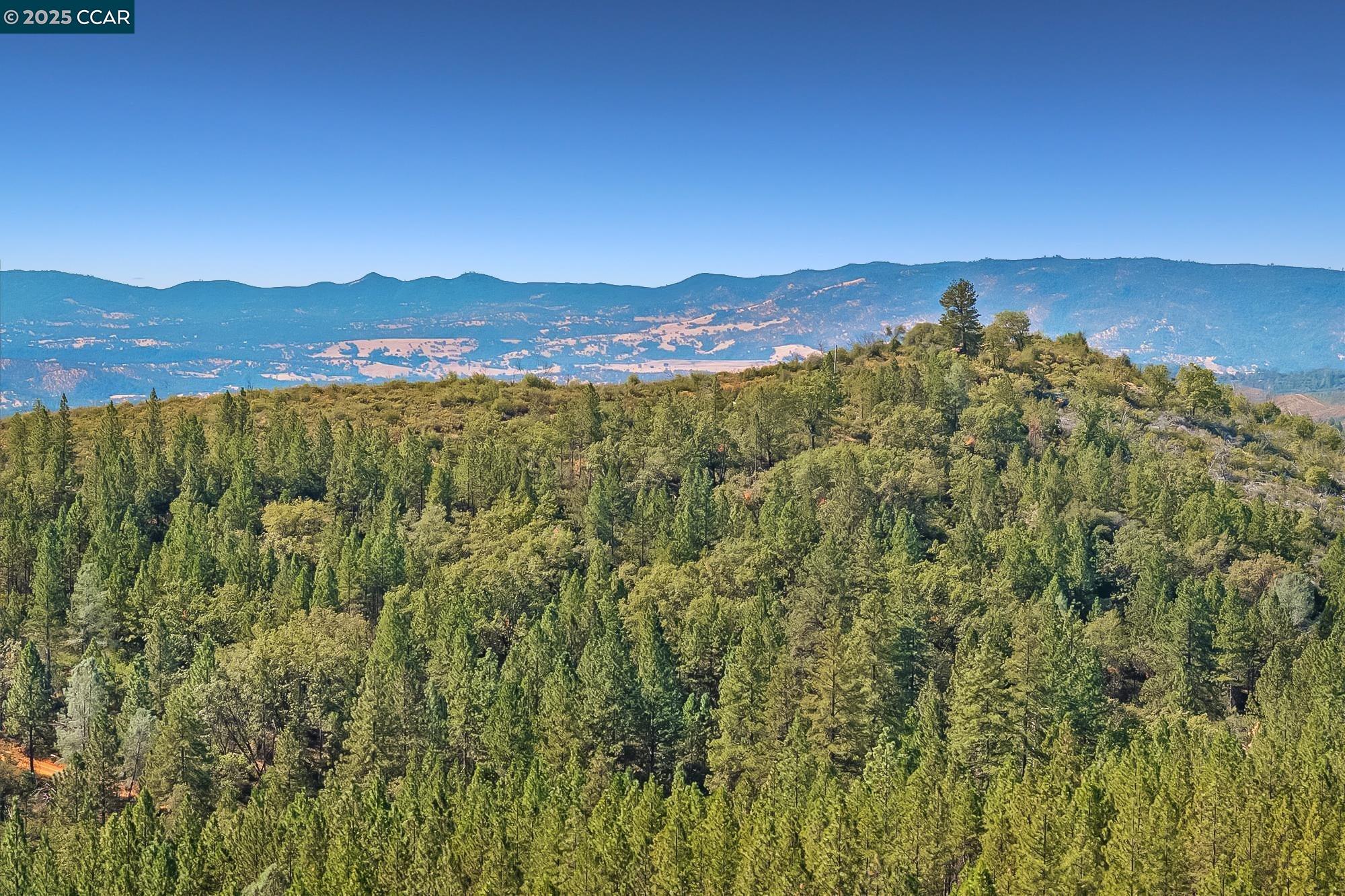 7559 Alamo Rd Mountain Ranch Mountain Ranch, CA 95246 - Photo 8 of 22 a view of a city with a mountain in the background