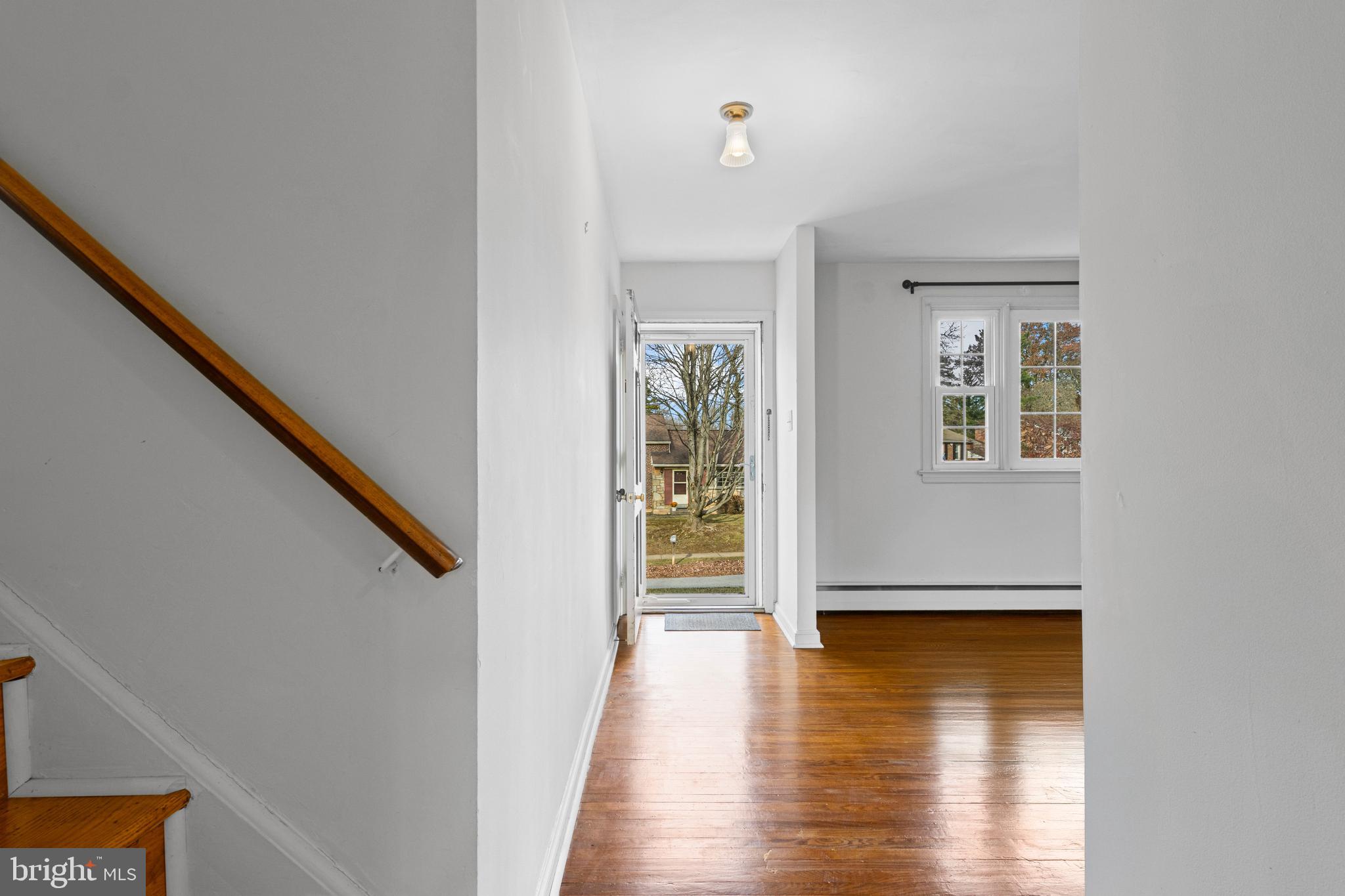 320 Landsende Road Devon, PA 19333 - Photo 13 of 26 a view of an entryway with wooden floor and door