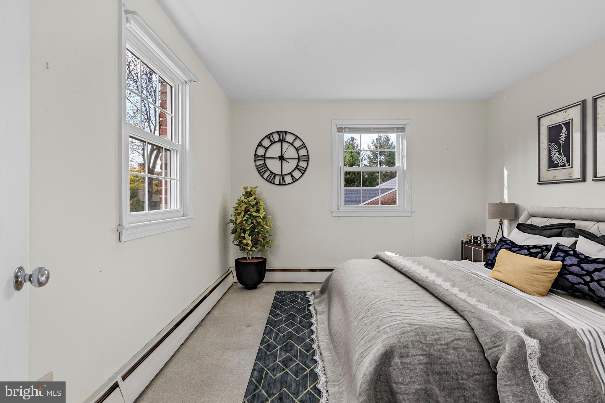 320 Landsende Road Devon, PA 19333 - Photo 14 of 26 a bedroom with a bed and a window