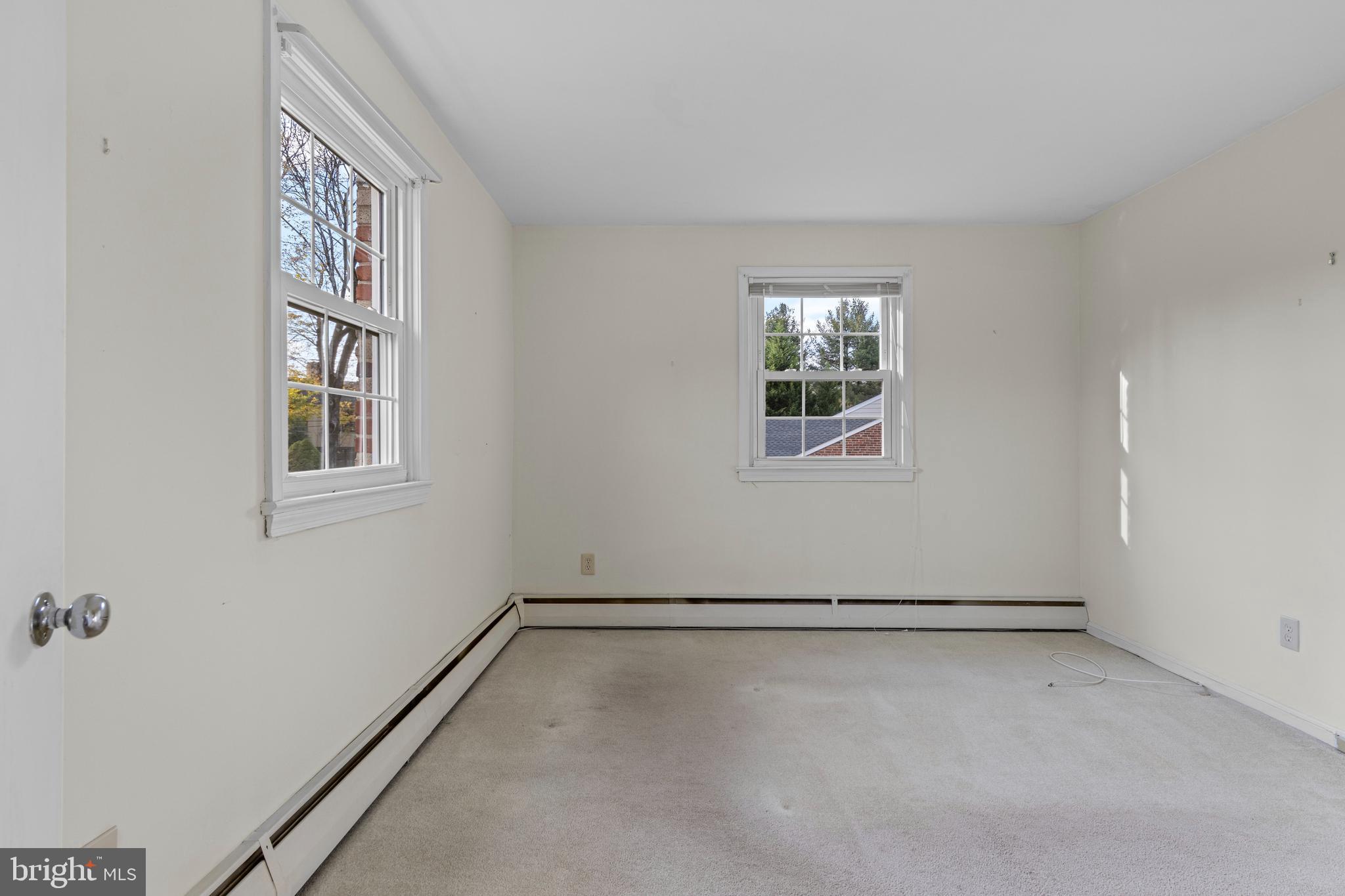 320 Landsende Road Devon, PA 19333 - Photo 15 of 26 a view of an empty room with a window