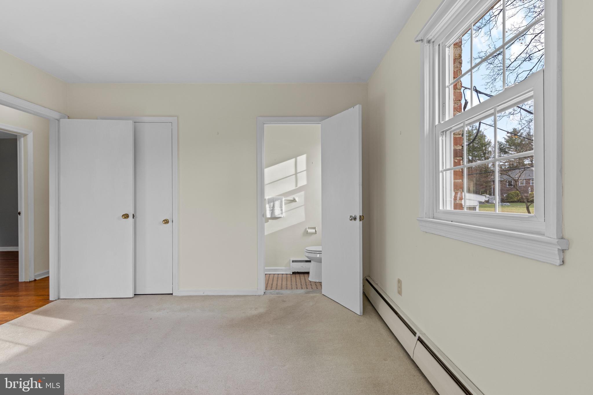 320 Landsende Road Devon, PA 19333 - Photo 16 of 26 a view of an empty room with a window