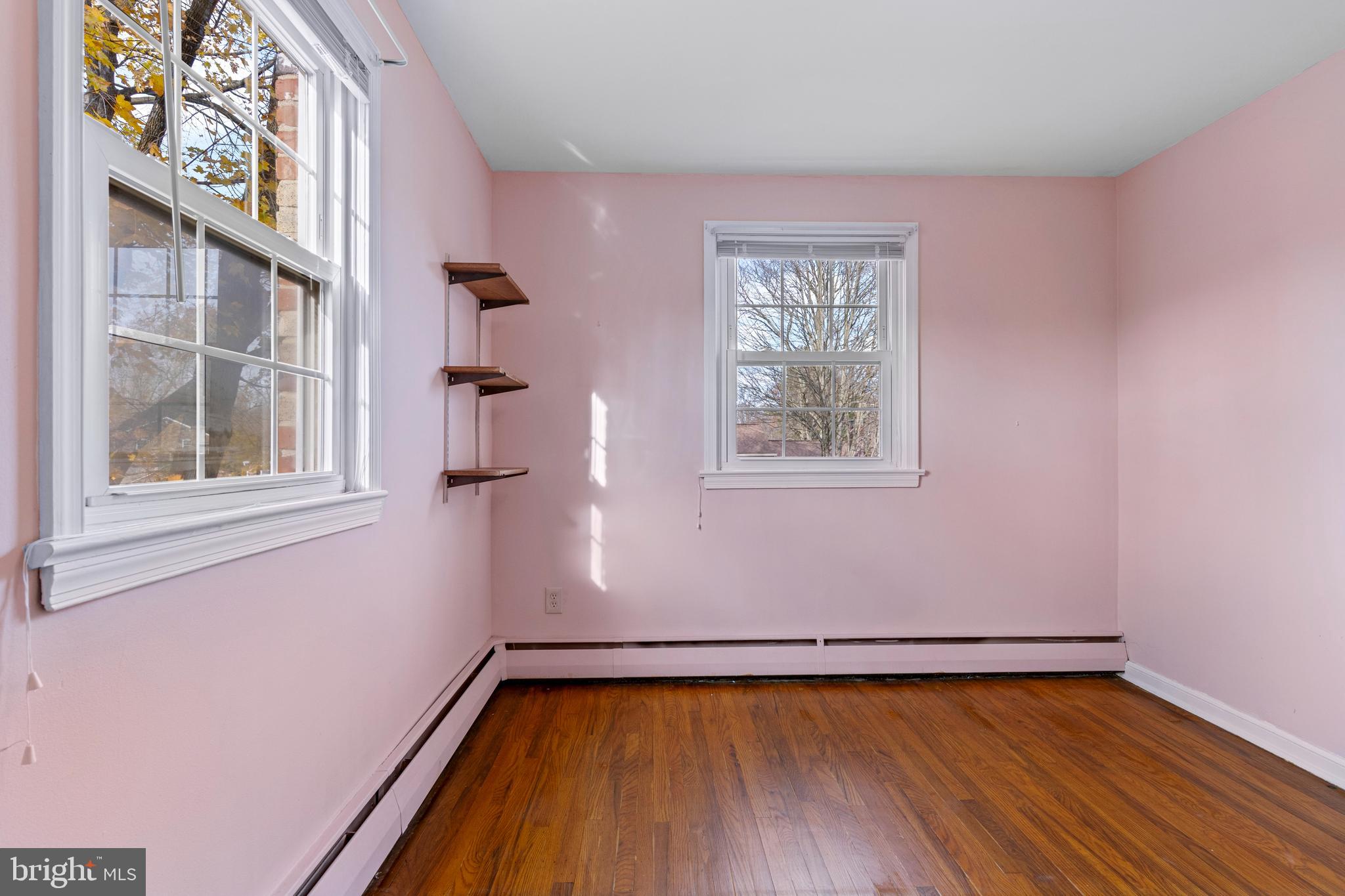 320 Landsende Road Devon, PA 19333 - Photo 20 of 26 a view of a room with wooden floor and a window