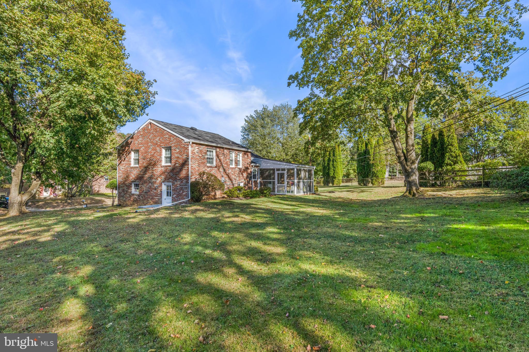 320 Landsende Road Devon, PA 19333 - Photo 2 of 26 a view of a park with large trees