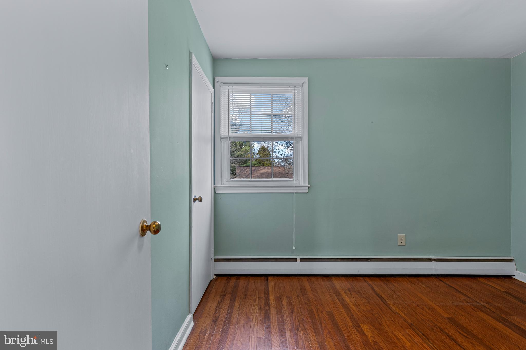 320 Landsende Road Devon, PA 19333 - Photo 22 of 26 a view of a small space with wooden floor and a window