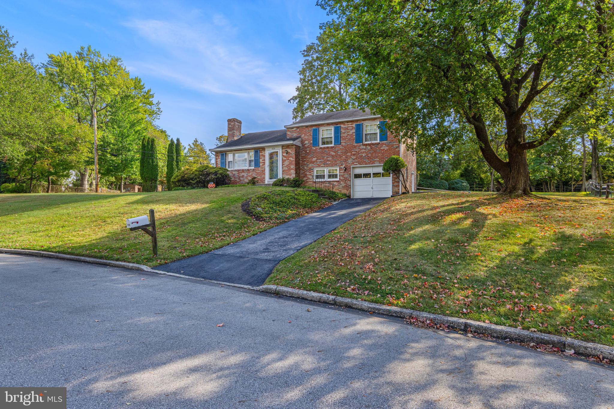 320 Landsende Road Devon, PA 19333 - Photo 26 of 26 a front view of a house with a yard