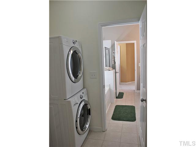 8211 Shadow Stone Court Raleigh, NC 27613 - Photo 15 of 25 Laundrey room connect to the master bath...Right where you need it!