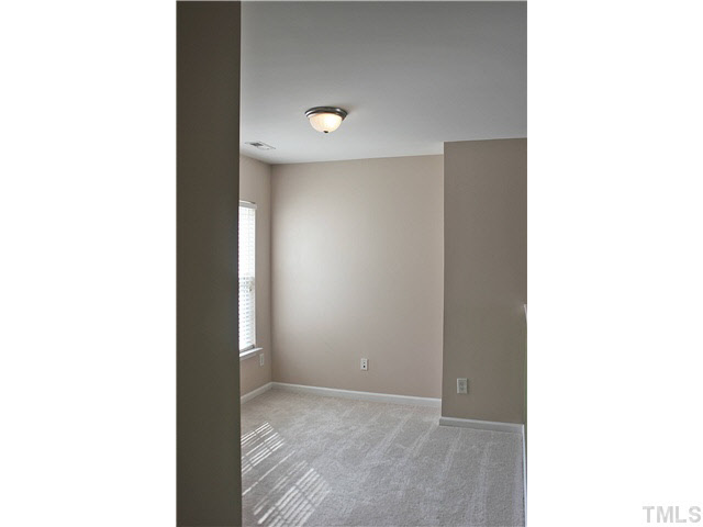 8211 Shadow Stone Court Raleigh, NC 27613 - Photo 18 of 25 Second floor loft could be used as office or another living room.