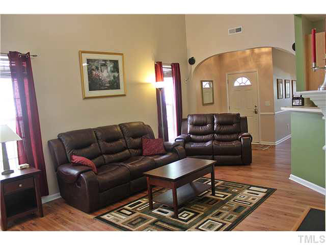 8211 Shadow Stone Court Raleigh, NC 27613 - Photo 6 of 25 Very pretty laminate flooring.