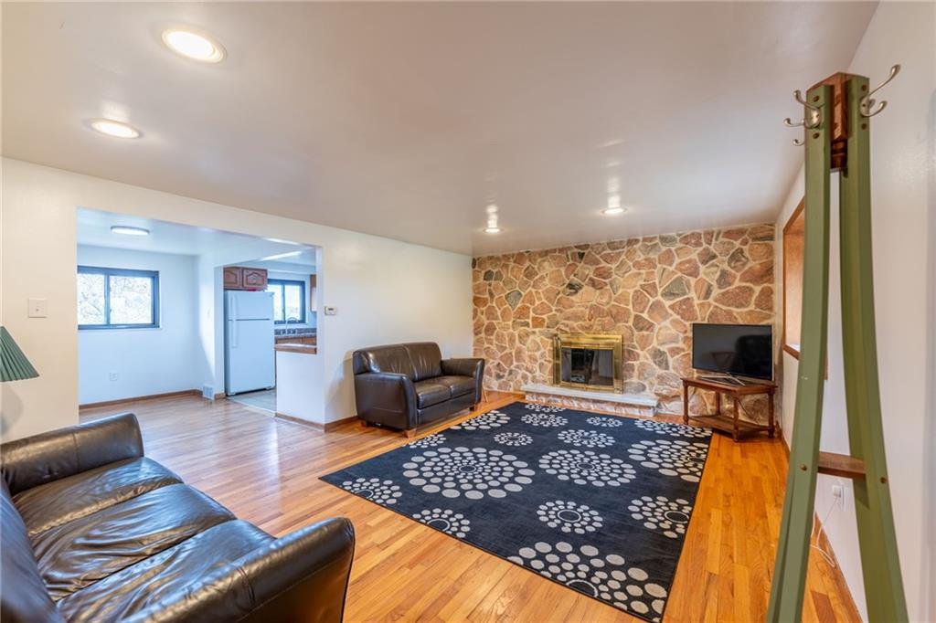 601 Hillcrest Avenue McKees Rocks, PA 15136 - Photo 3 of 32 a living room with furniture rug and a fireplace