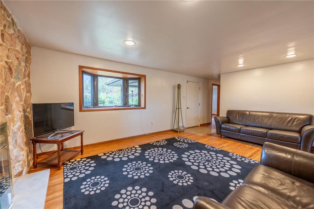 601 Hillcrest Avenue McKees Rocks, PA 15136 - Photo 5 of 32 a living room with a couch and a flat screen tv