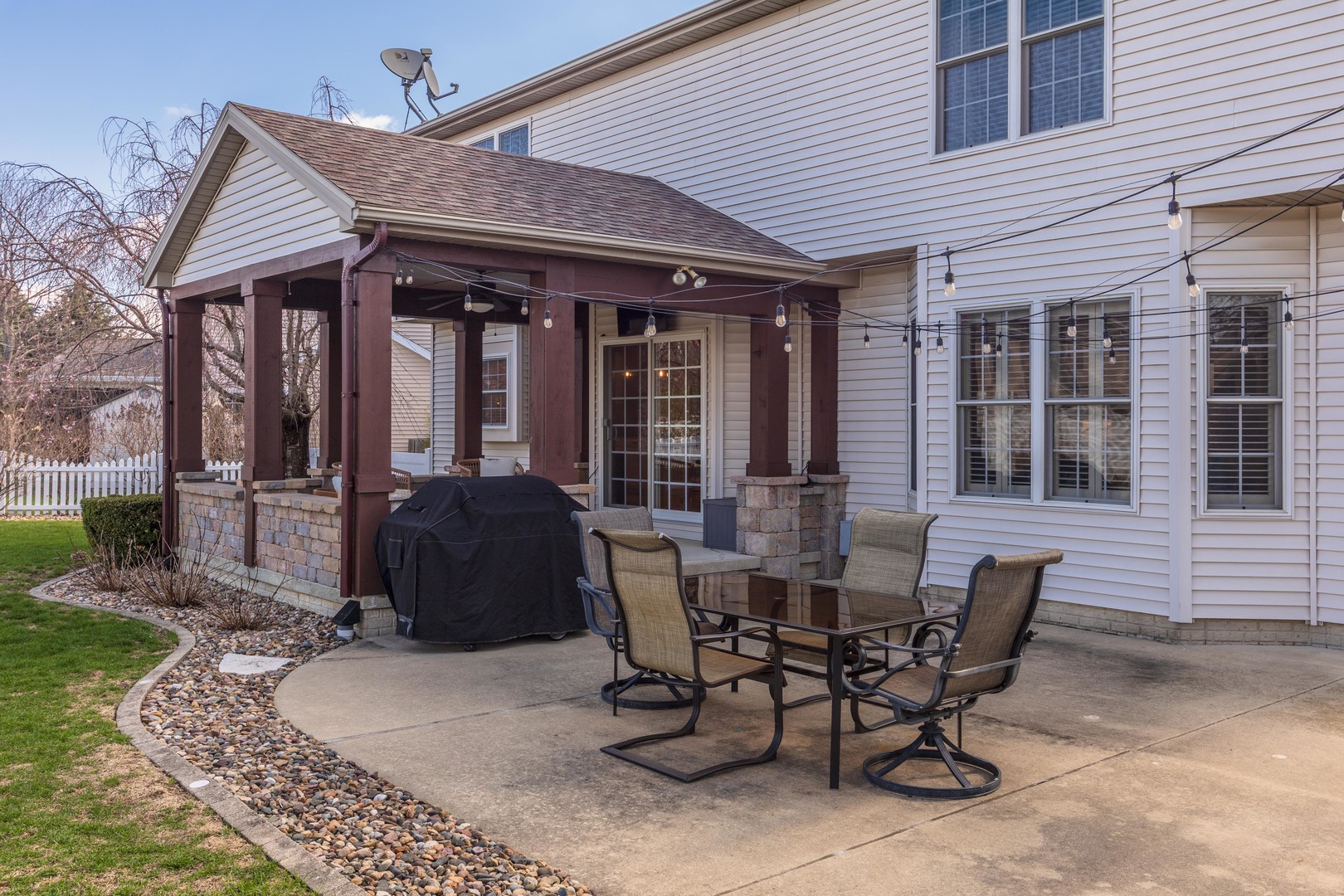 1223 Joy Walk Way Normal, IL 61761 - Photo 39 of 48 a view of a patio with table and chairs and potted plants