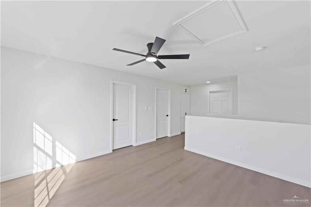 6300 North 21st Street McAllen, TX 78504 - Photo 11 of 19 a view of a livingroom with a ceiling fan and window