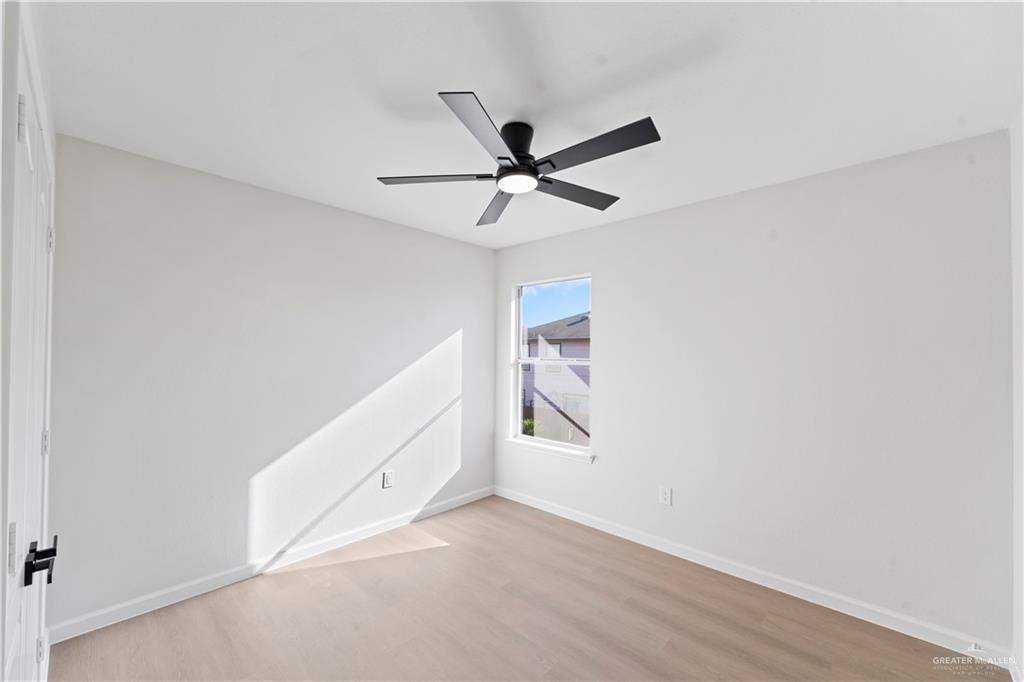 6300 North 21st Street McAllen, TX 78504 - Photo 13 of 19 a view of a livingroom with an empty space