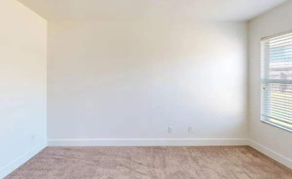 an empty room with a window