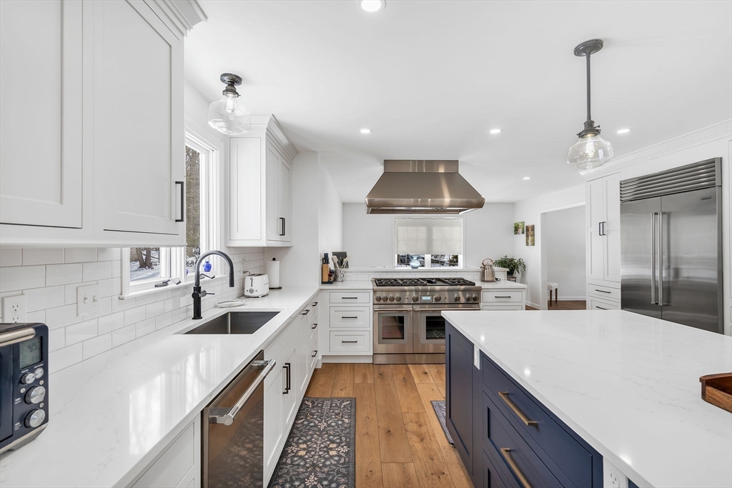 84 Jefferson Road Franklin, MA 02038 - Photo 13 of 39 a kitchen with stainless steel appliances granite countertop a sink stove and refrigerator