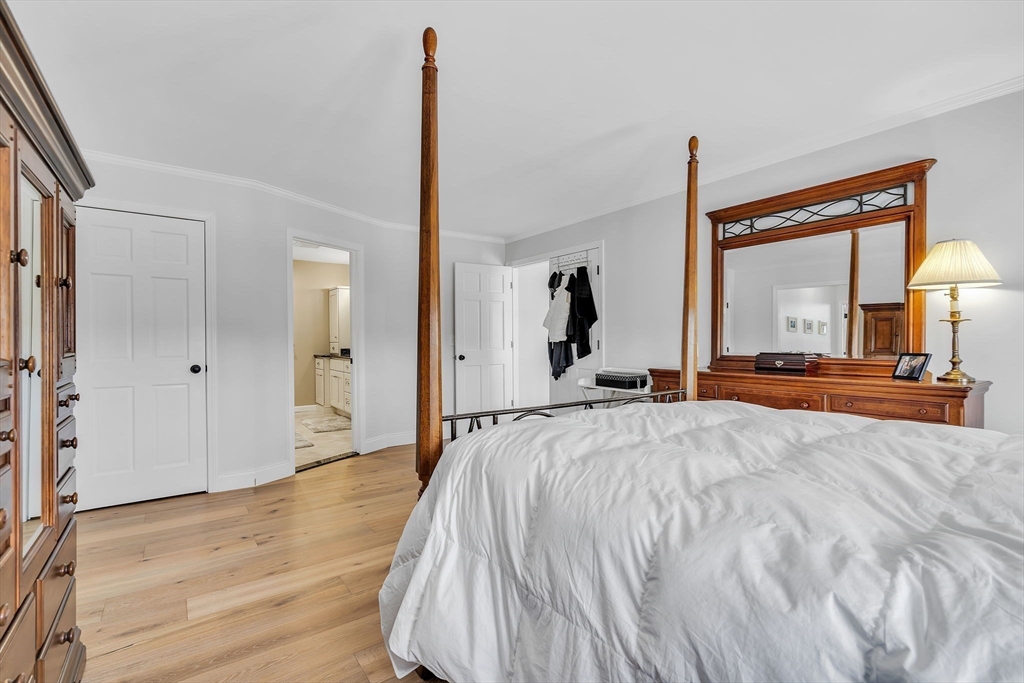 84 Jefferson Road Franklin, MA 02038 - Photo 22 of 39 a bed room with a bed and a large mirror