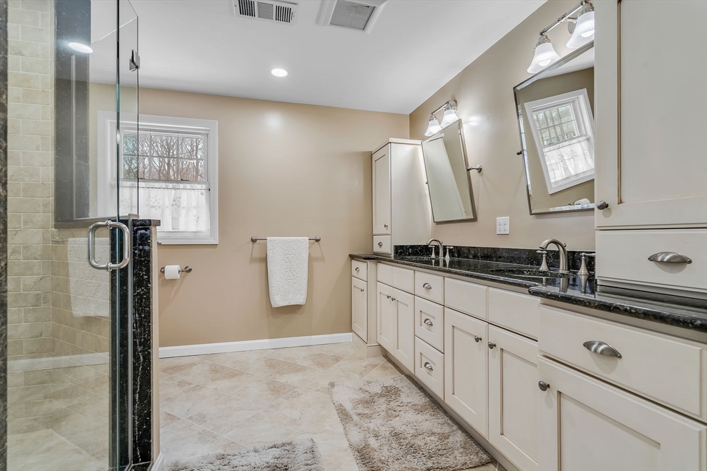 84 Jefferson Road Franklin, MA 02038 - Photo 23 of 39 a bathroom with a double vanity sink and a mirror