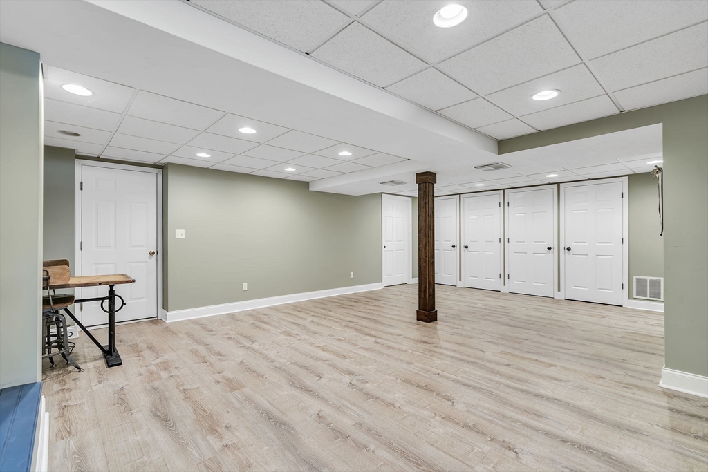 84 Jefferson Road Franklin, MA 02038 - Photo 30 of 39 a view of an empty room with wooden floor