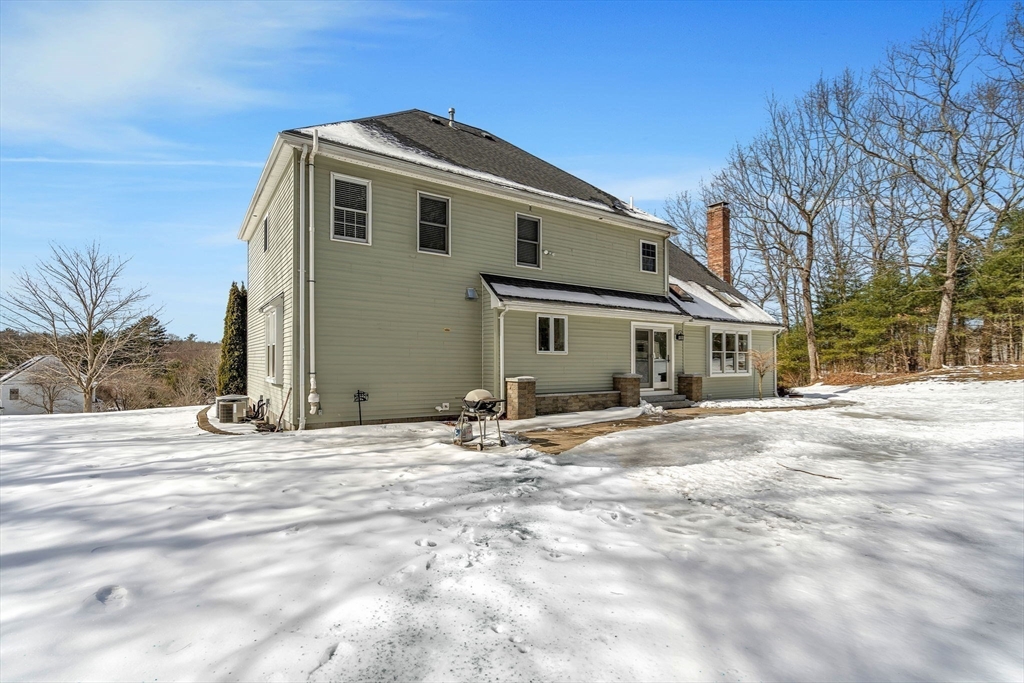 84 Jefferson Road Franklin, MA 02038 - Photo 33 of 39 a front view of a house with a road