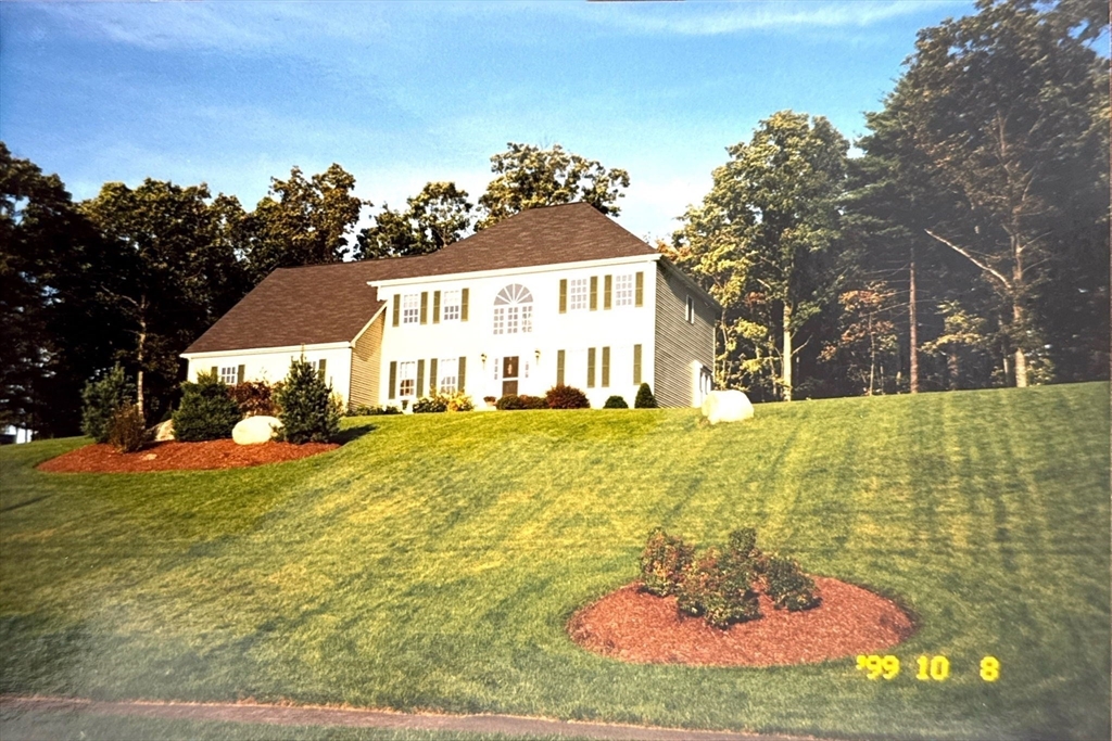 84 Jefferson Road Franklin, MA 02038 - Photo 37 of 39 a front view of a house with a yard