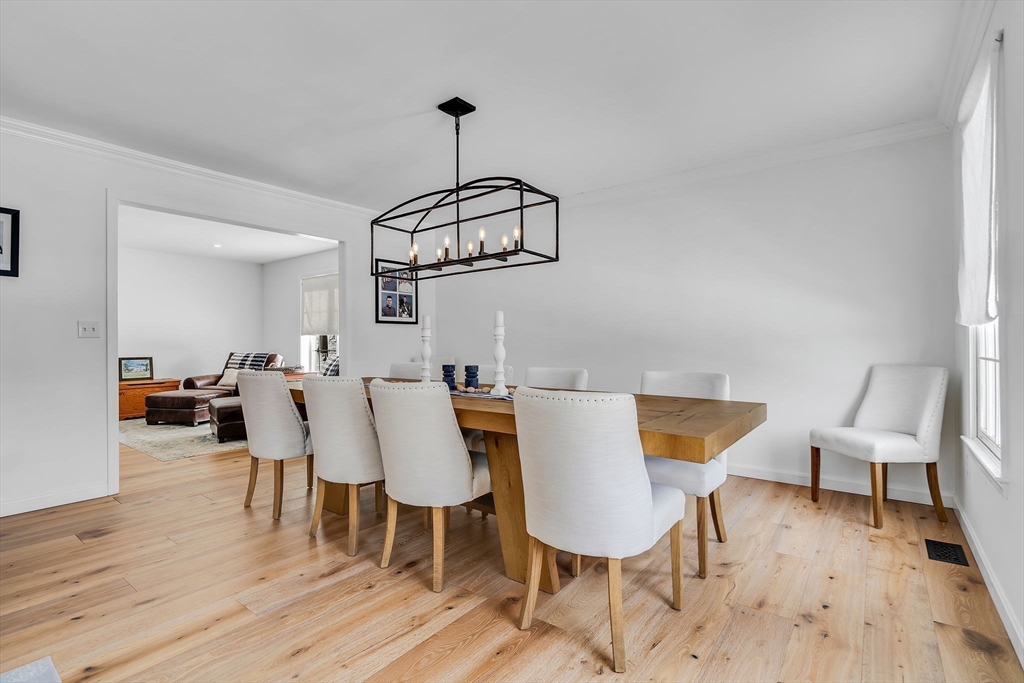 84 Jefferson Road Franklin, MA 02038 - Photo 5 of 39 a view of a dining room with furniture and wooden floor