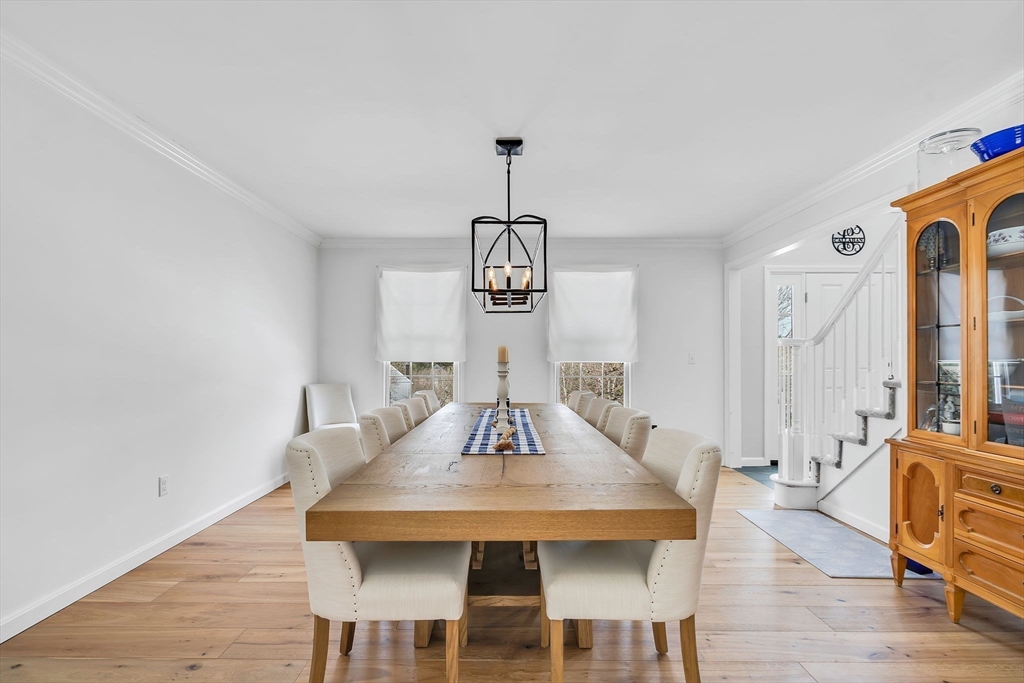 84 Jefferson Road Franklin, MA 02038 - Photo 6 of 39 a view of a dining room with furniture wooden floor and chandelier