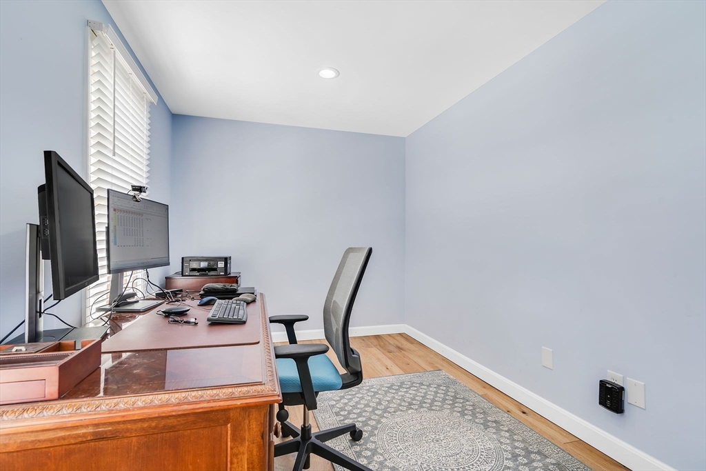 84 Jefferson Road Franklin, MA 02038 - Photo 7 of 39 a dining room with furniture and a flat screen tv