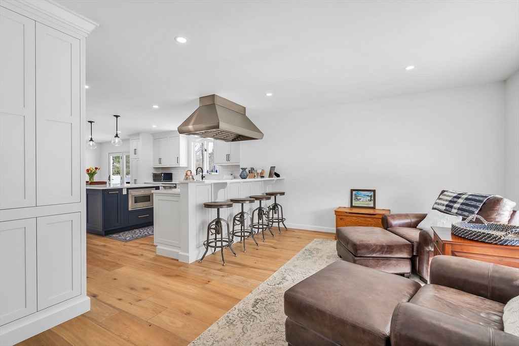 84 Jefferson Road Franklin, MA 02038 - Photo 8 of 39 a living room with furniture and a table
