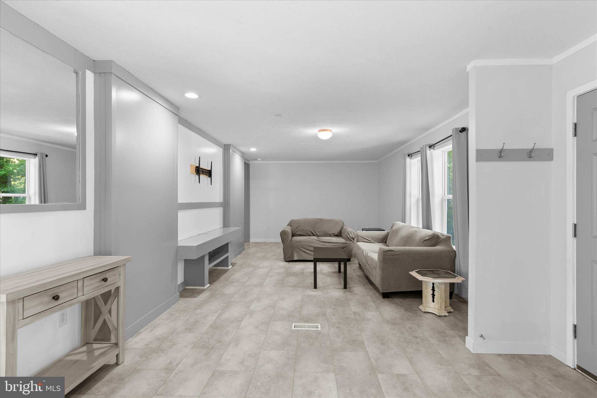 9249 Croppers Island Road Newark, MD 21841 - Photo 4 of 48 LIVING ROOM HAS LVP FLOORING