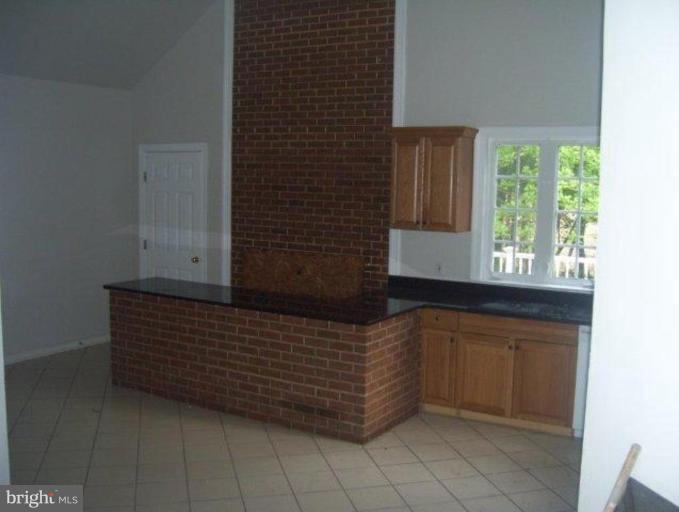 kitchen area behind the garage