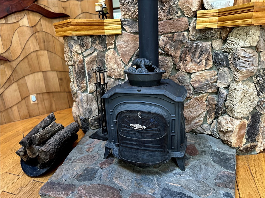 26285 Augusta Drive Lake Arrowhead, CA 92352 - Photo 11 of 47 a close view of a fireplace in the room