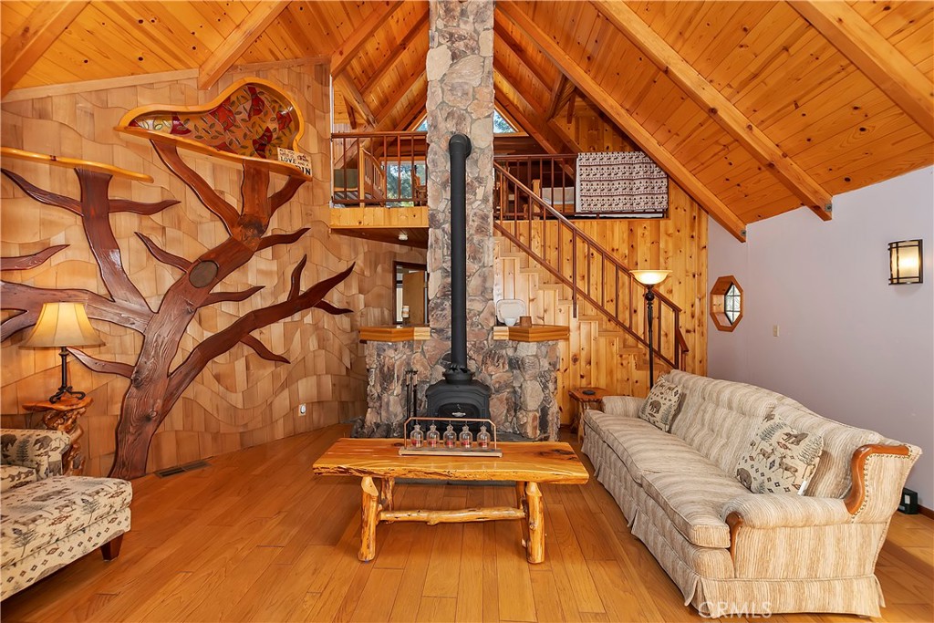 26285 Augusta Drive Lake Arrowhead, CA 92352 - Photo 17 of 47 a building outdoor space with patio furniture