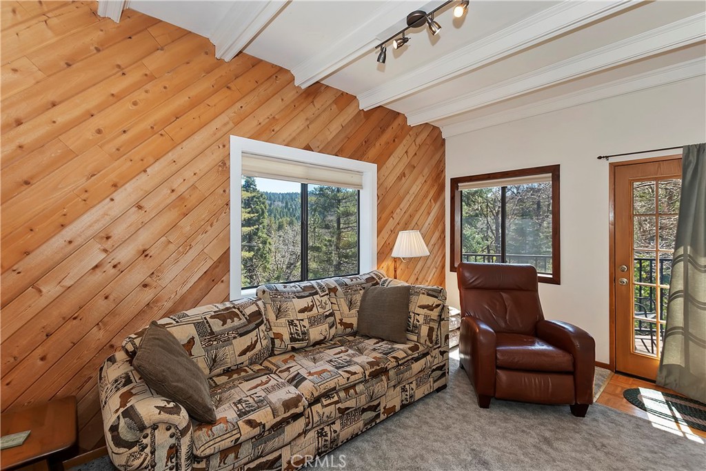 26285 Augusta Drive Lake Arrowhead, CA 92352 - Photo 19 of 47 a bedroom with furniture and a window