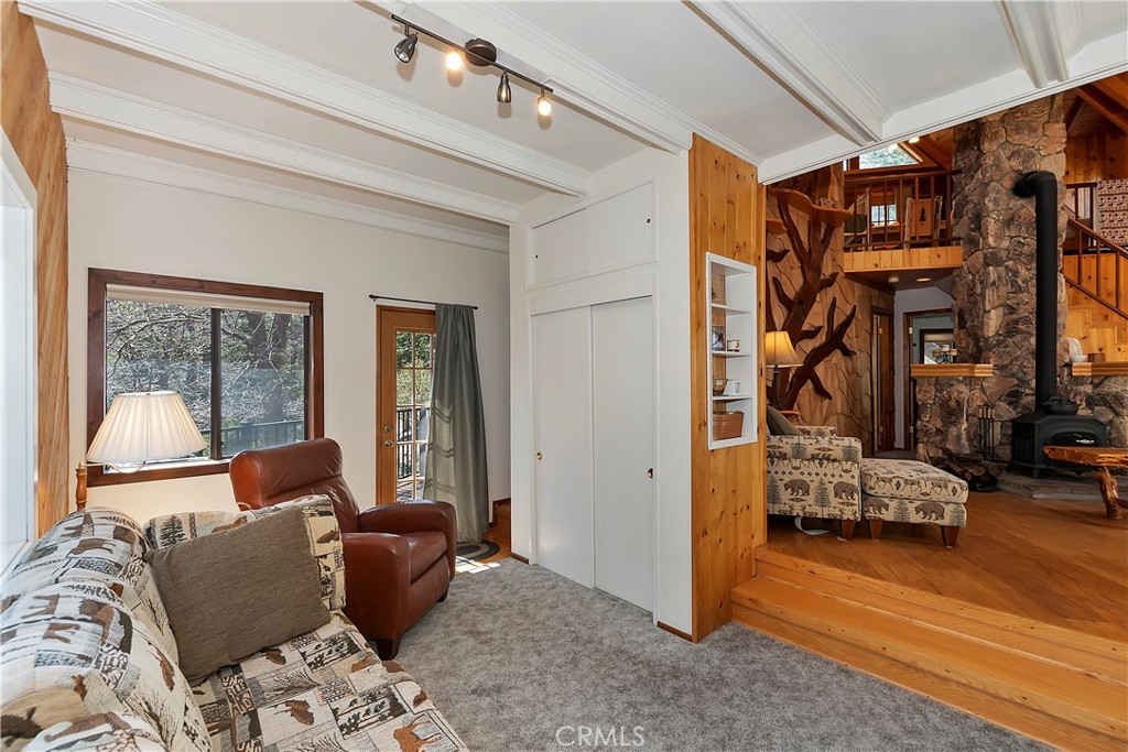 26285 Augusta Drive Lake Arrowhead, CA 92352 - Photo 20 of 47 a living room with furniture and a window