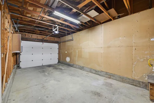 a view of an empty room with furniture