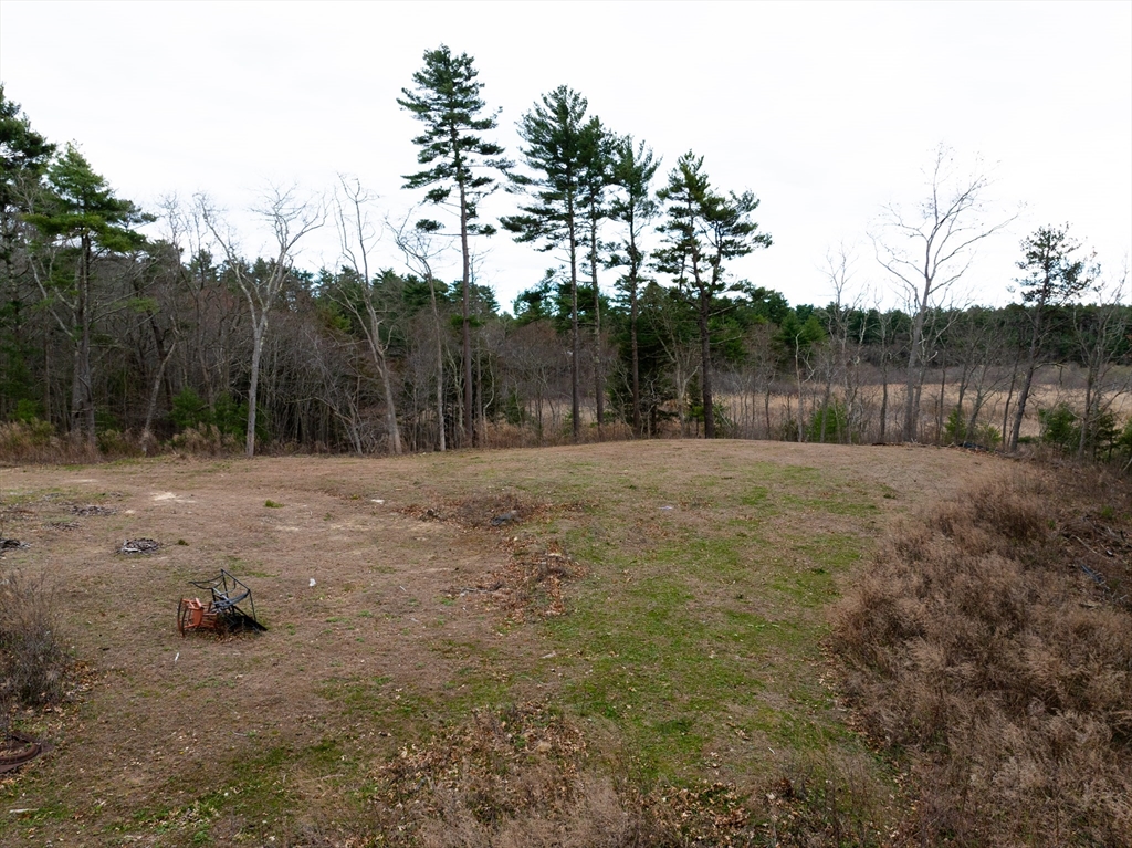 17 Station Street Wareham, MA 02571 - Photo 4 of 8 a backyard of a house with lots of green space