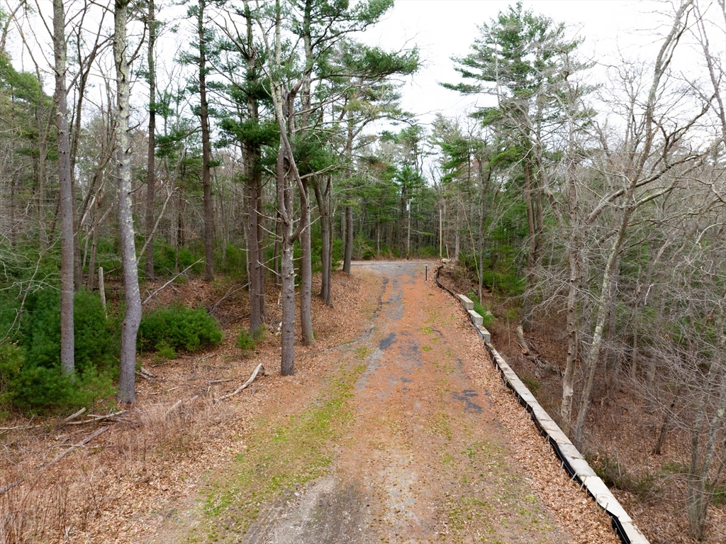 17 Station Street Wareham, MA 02571 - Photo 6 of 8 a view of a pathway with a yard