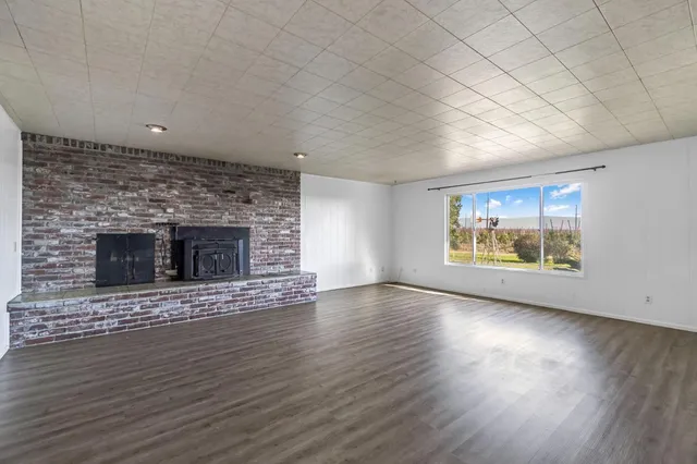 a view of a livingroom with a flat screen tv