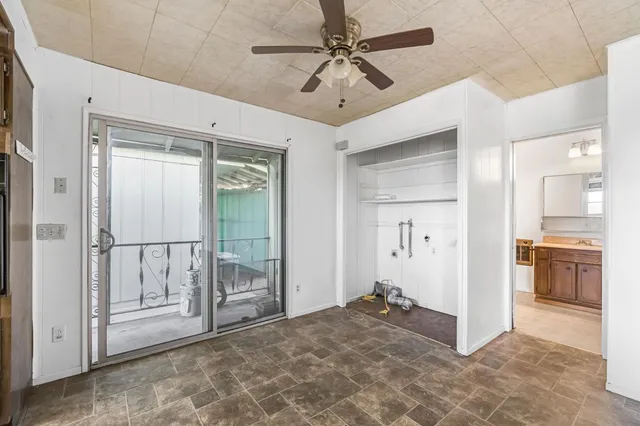 a kitchen that has a sink and a stove