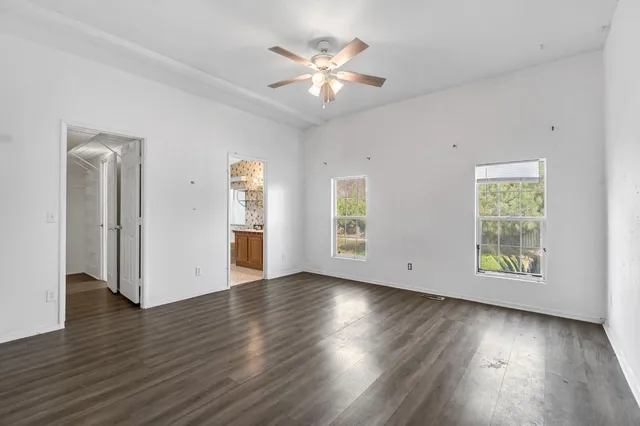 a view of front door with wooden floor