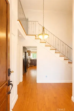 a view of a hallway with staircase