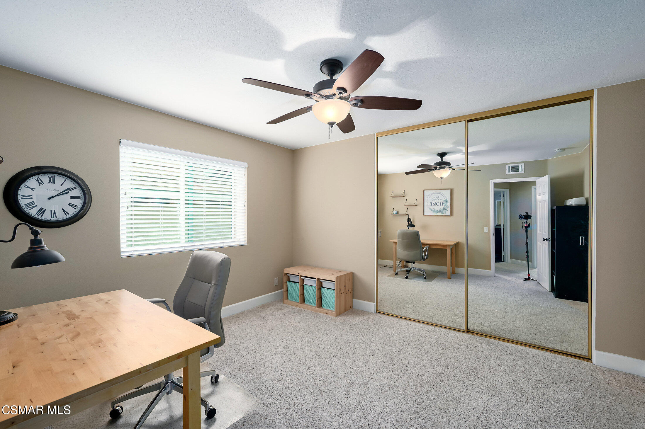 12142 Cherry Grove Street Moorpark, CA 93021 - Photo 28 of 36 a workspace with furniture and a window