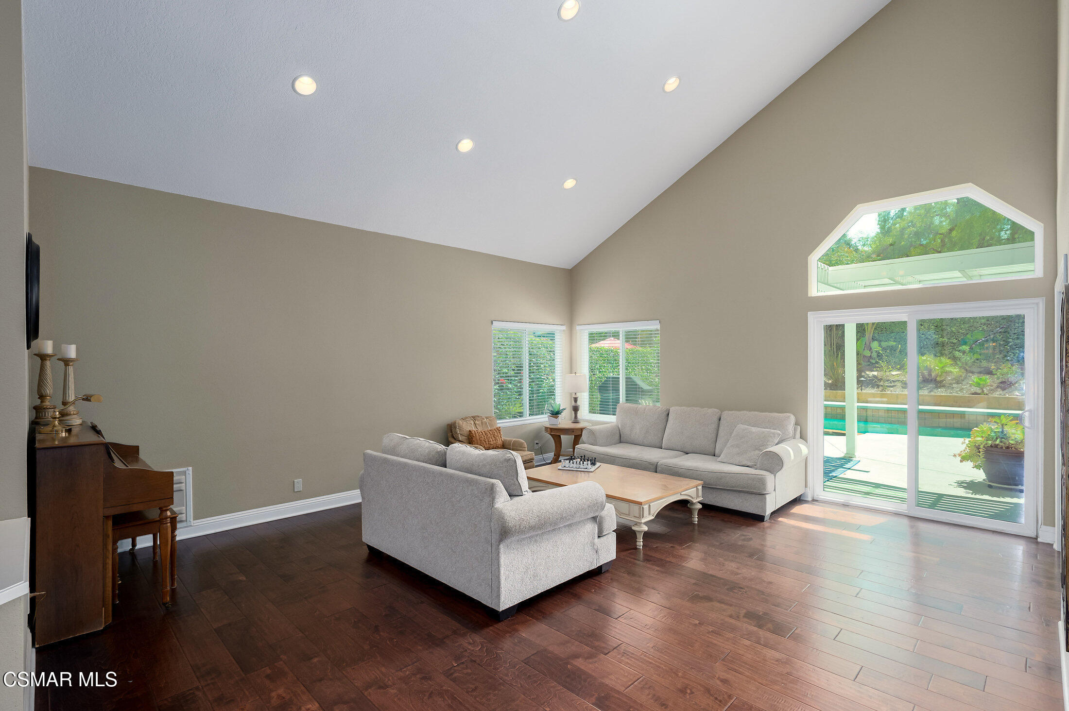 12142 Cherry Grove Street Moorpark, CA 93021 - Photo 4 of 36 a living room with furniture and a large window