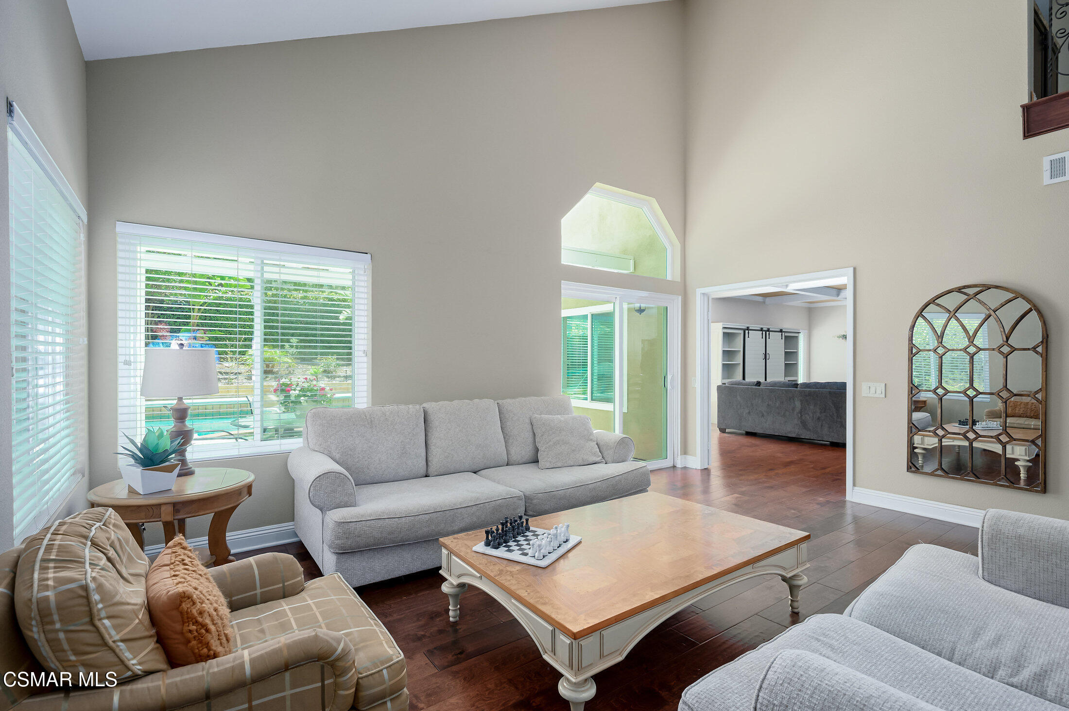 12142 Cherry Grove Street Moorpark, CA 93021 - Photo 6 of 36 a living room with furniture and a large window