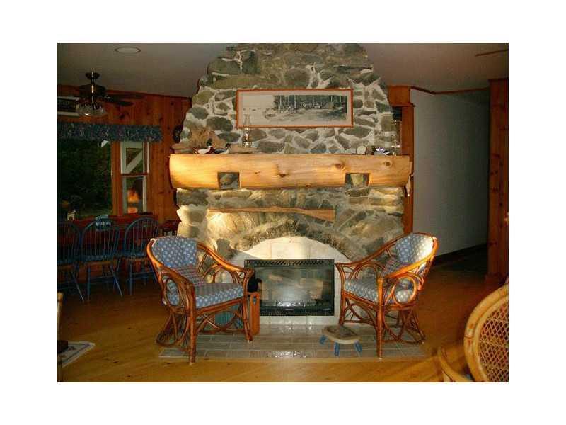 22 Gray Road Harrison, ME 04040 - Photo 12 of 35 Other. Fireplace in main lodge